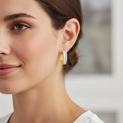 Perlizia gold-plated S925 sterling silver huggie hoop earrings with triple rows of baguette and round moissanite stones.