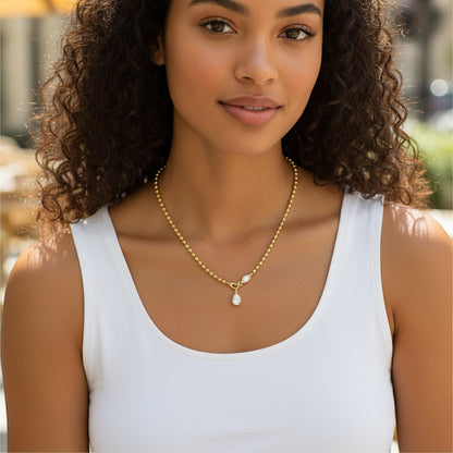 Perlizia gold-plated S925 sterling silver necklace with a pear-cut moissanite pendant and beaded ball chain.