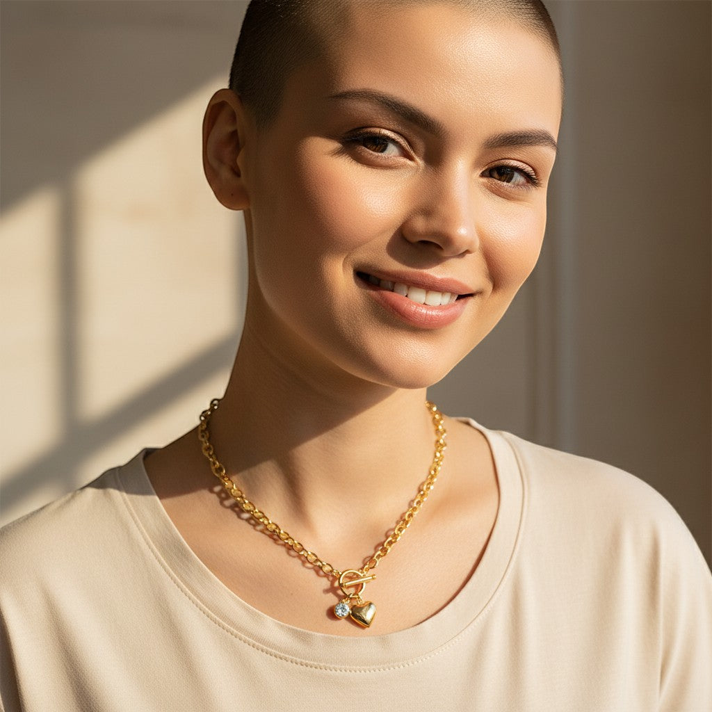 Perlizia gold plated S925 sterling silver toggle necklace with a heart charm and a 1ct moissanite stone.