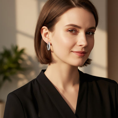 Perlizia platinum-plated S925 sterling silver hoop earrings with full eternity moissanite stones.