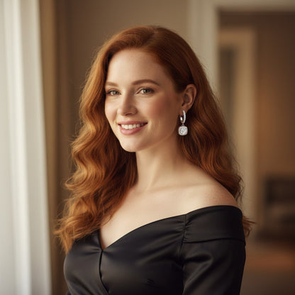 Perlizia platinum-plated S925 silver drop earrings with 0.5ct moissanite center stone and halo.