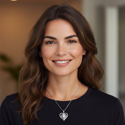 Perlizia 1ct Moissanite double heart pendant necklace in platinum-plated sterling silver with pavé accents.