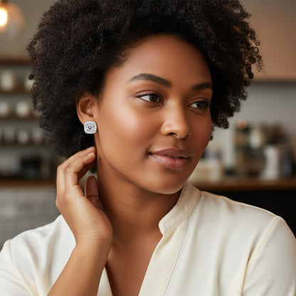 Perlizia platinum-plated sterling silver moissanite stud earrings with halo setting. Available in 0.5-2ct.