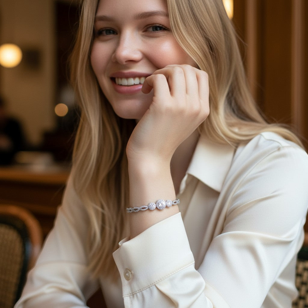 Perlizia 1-carat moissanite tennis bracelet with triple halo center and infinity links, platinum-plated sterling silver.