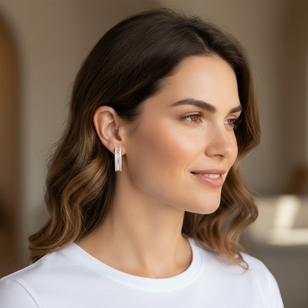 Perlizia rose gold triple-row huggie hoop earrings with baguette and round moissanite stones, platinum plated S925 sterling silver.